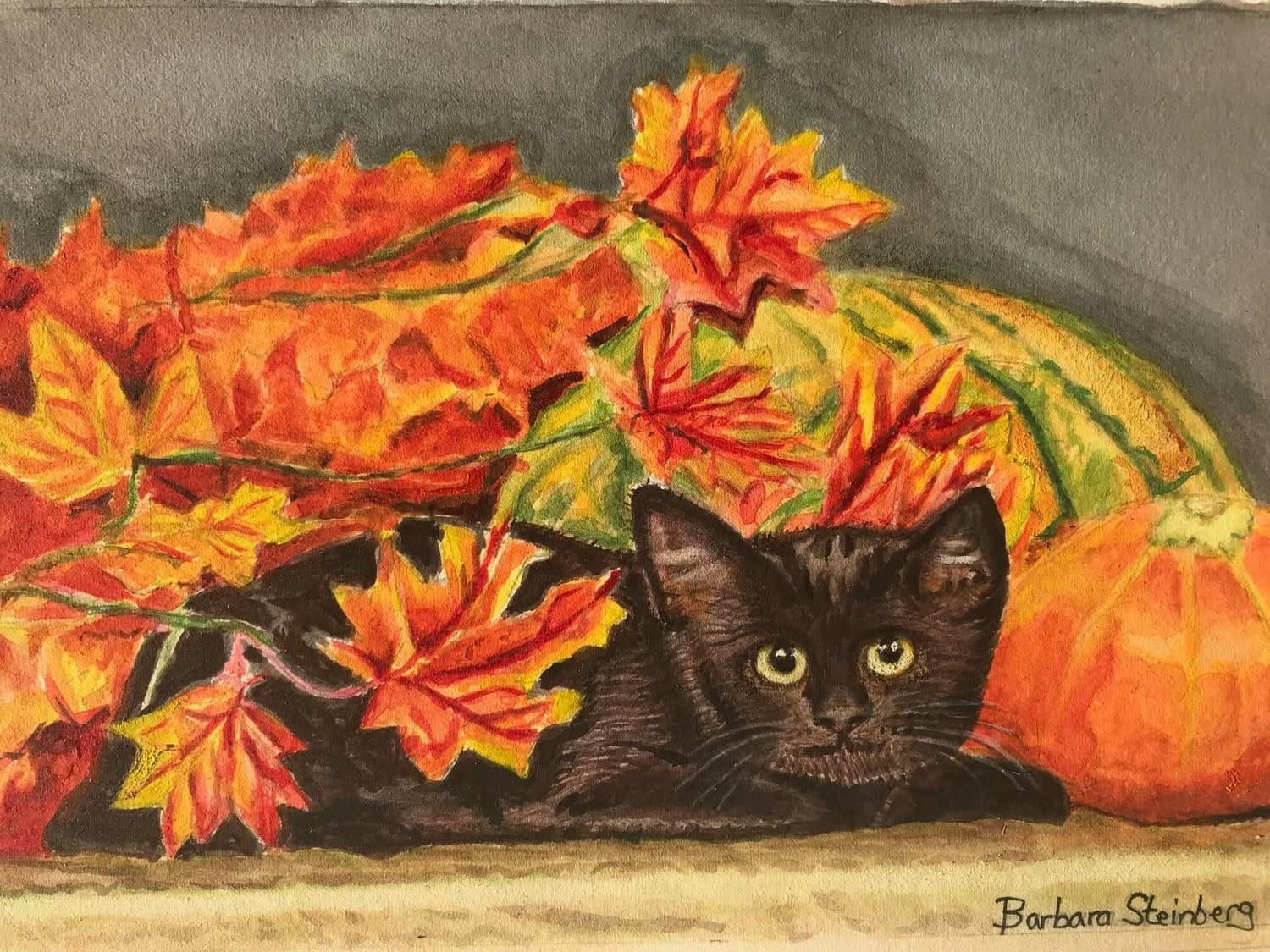 Watercolor of a black cat nestled among autumn maple leaves and pumpkins