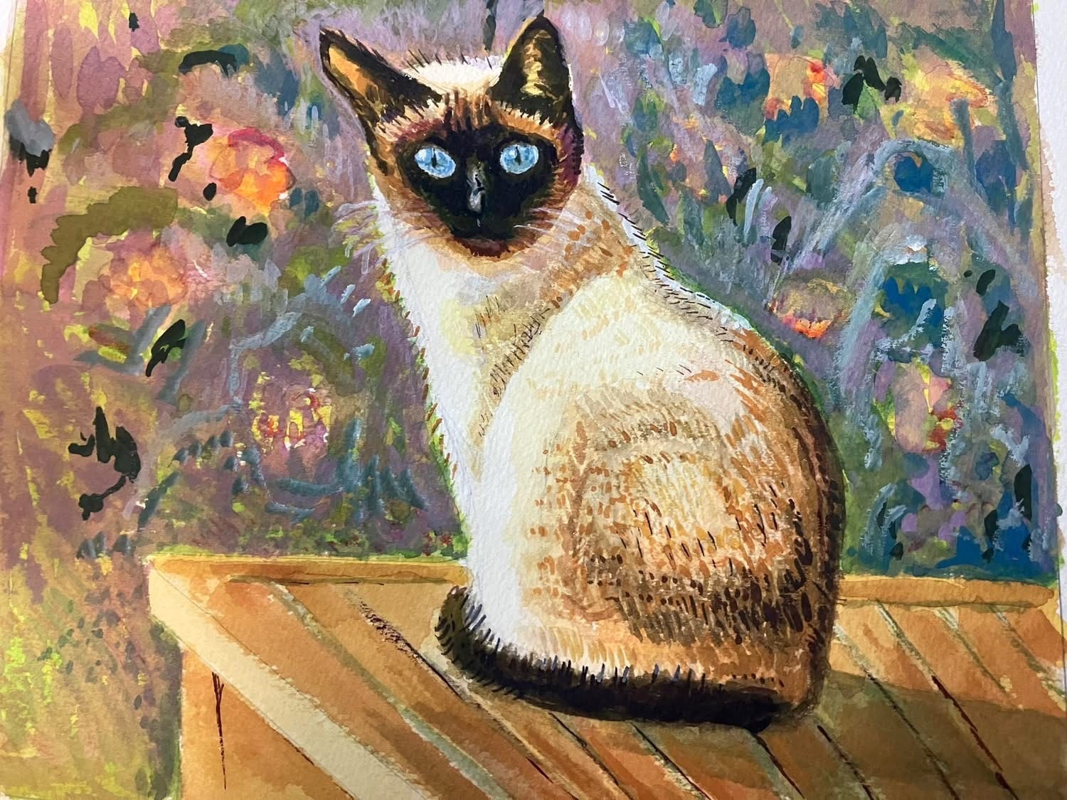 Watercolor of a Siamese cat with striking blue eyes seated against a colorful floral garden background